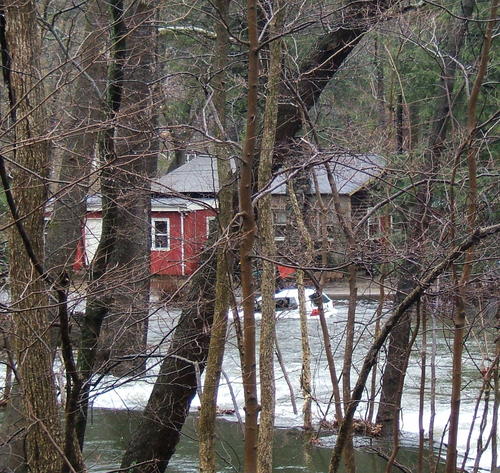 House_and_car_in_river